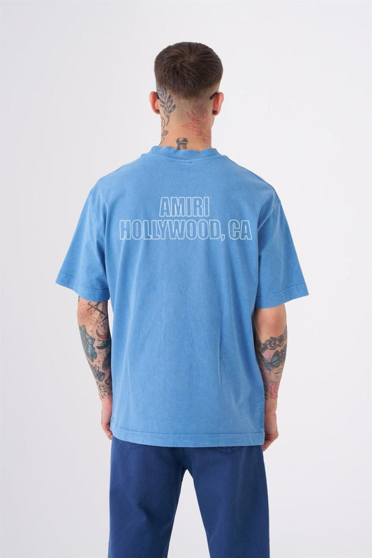 Amiri Hollywood CA Graphic Tee – Blue